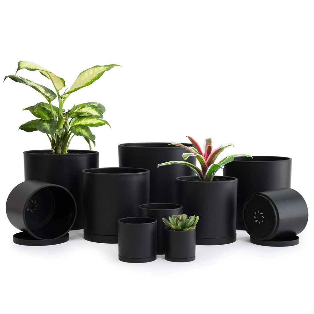 D'vine Dev front view of ten black pots showing the full set and sizes
