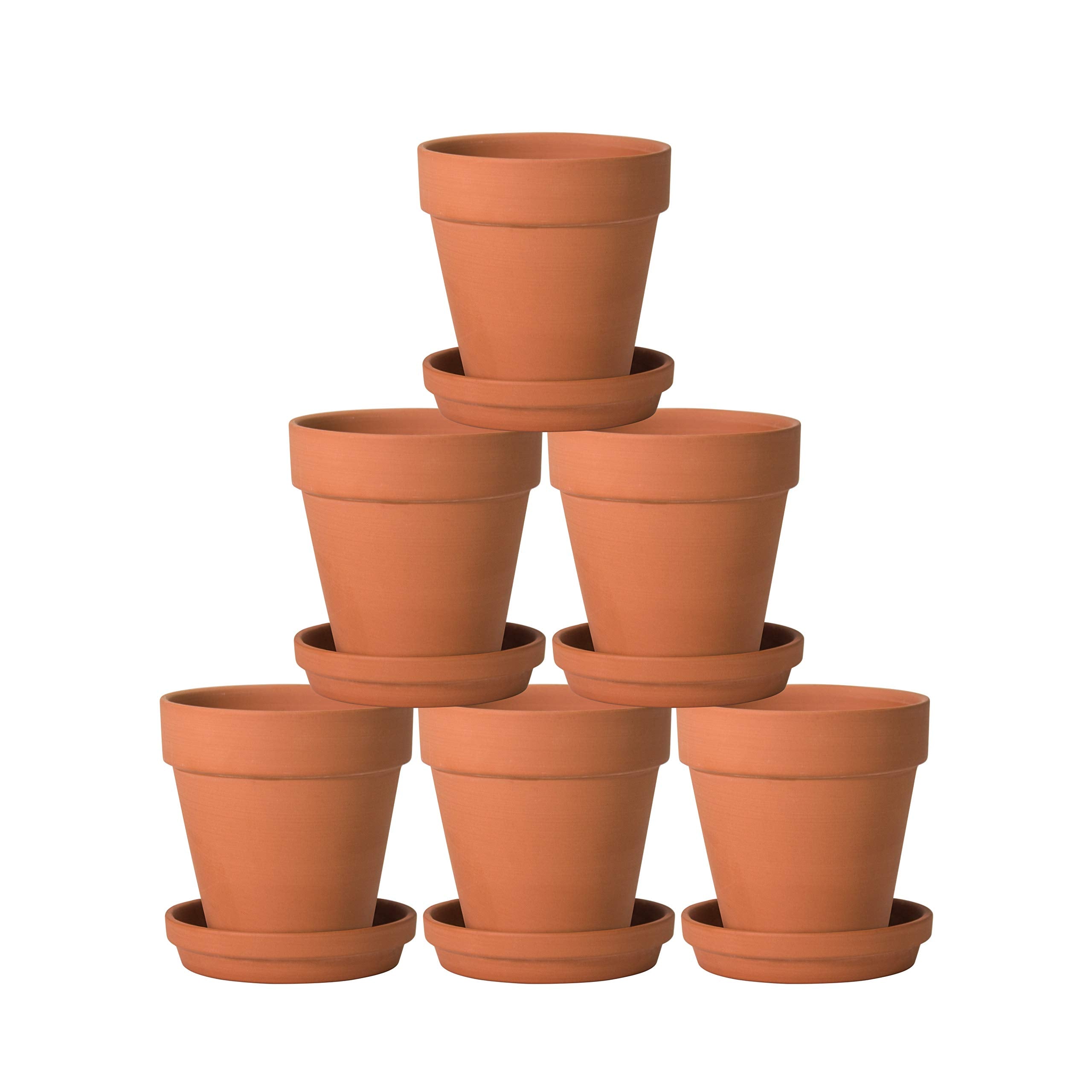 D'vine Dev styled group of pots in a living room to show decorative versatility and cohesive look