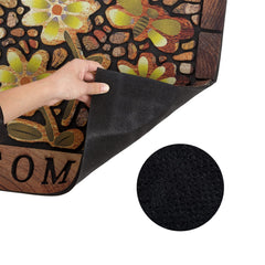 DWKKX mat installed in a doorway showing scale and low-profile fit under door