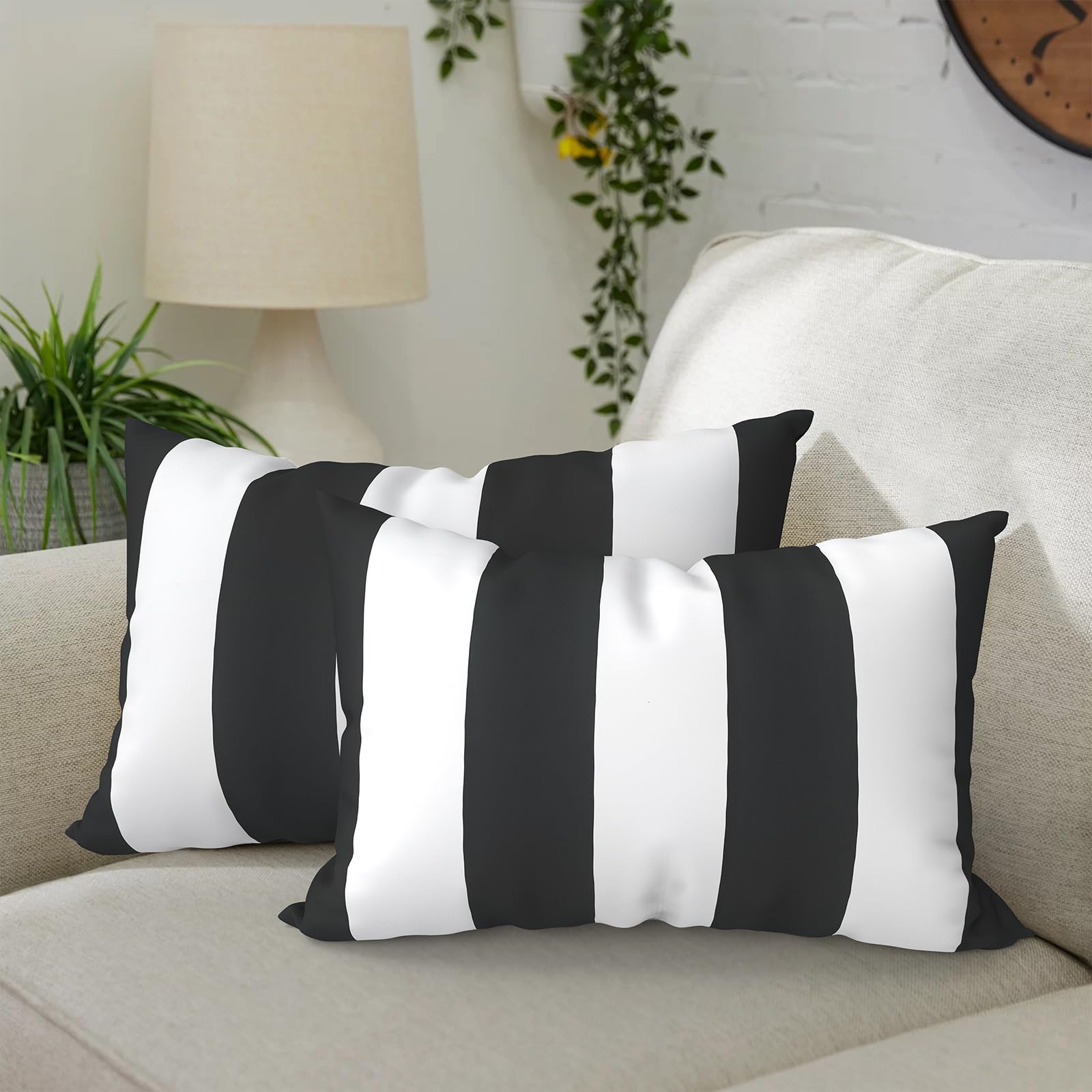 DYTXIII front view cabana black pillow showing pattern and benefit of weather-ready style