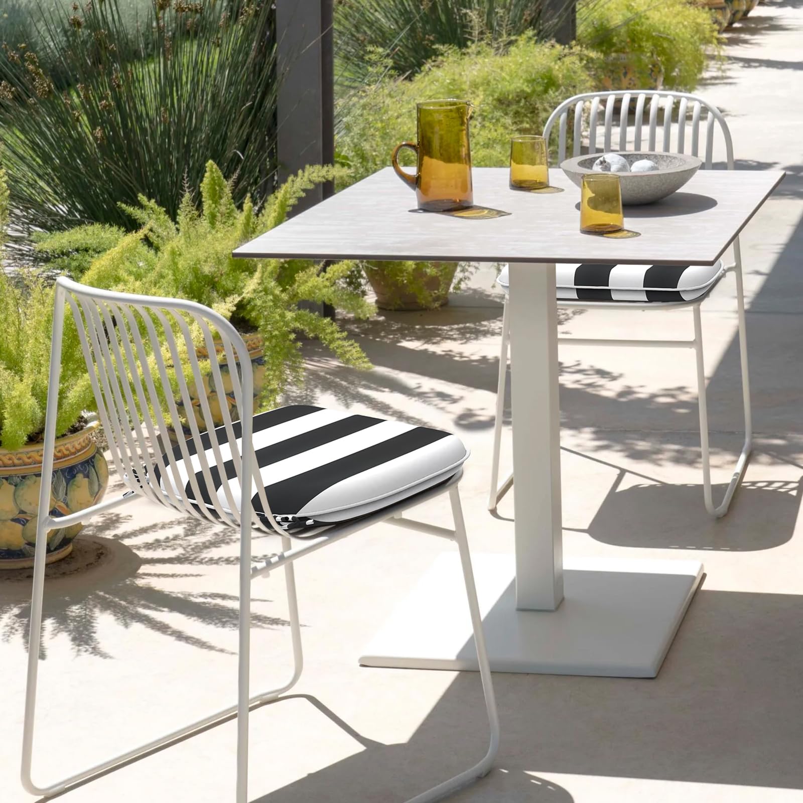 DYTXIII cushions placed on patio chairs for comfortable outdoor dining
