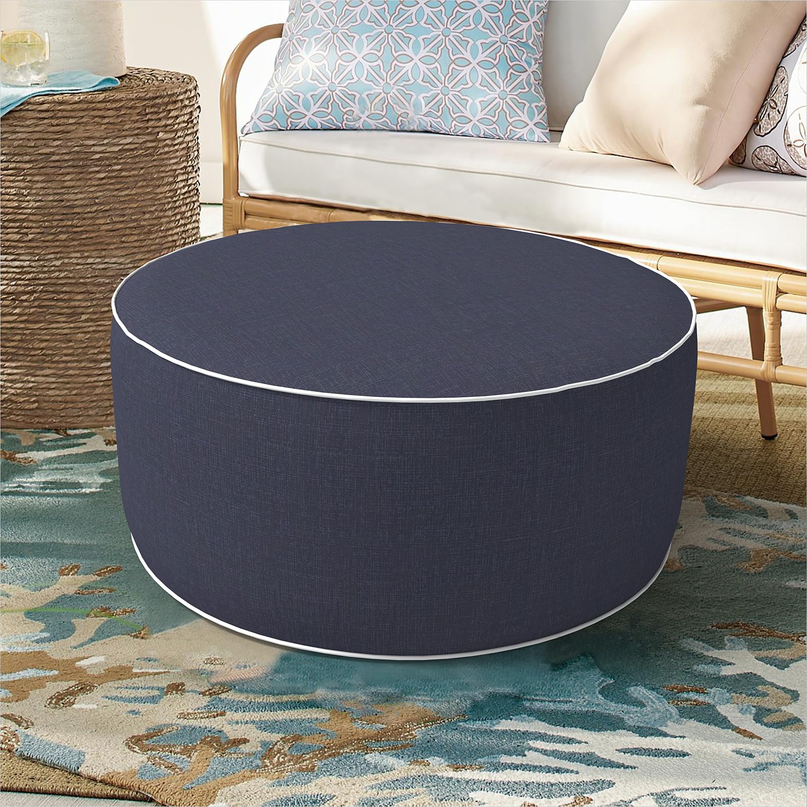 DYTXIII ottoman front view showing navy cover and compact profile for convenient seating