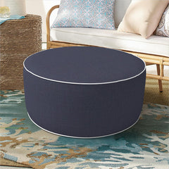 DYTXIII ottoman front view showing navy cover and compact profile for convenient seating