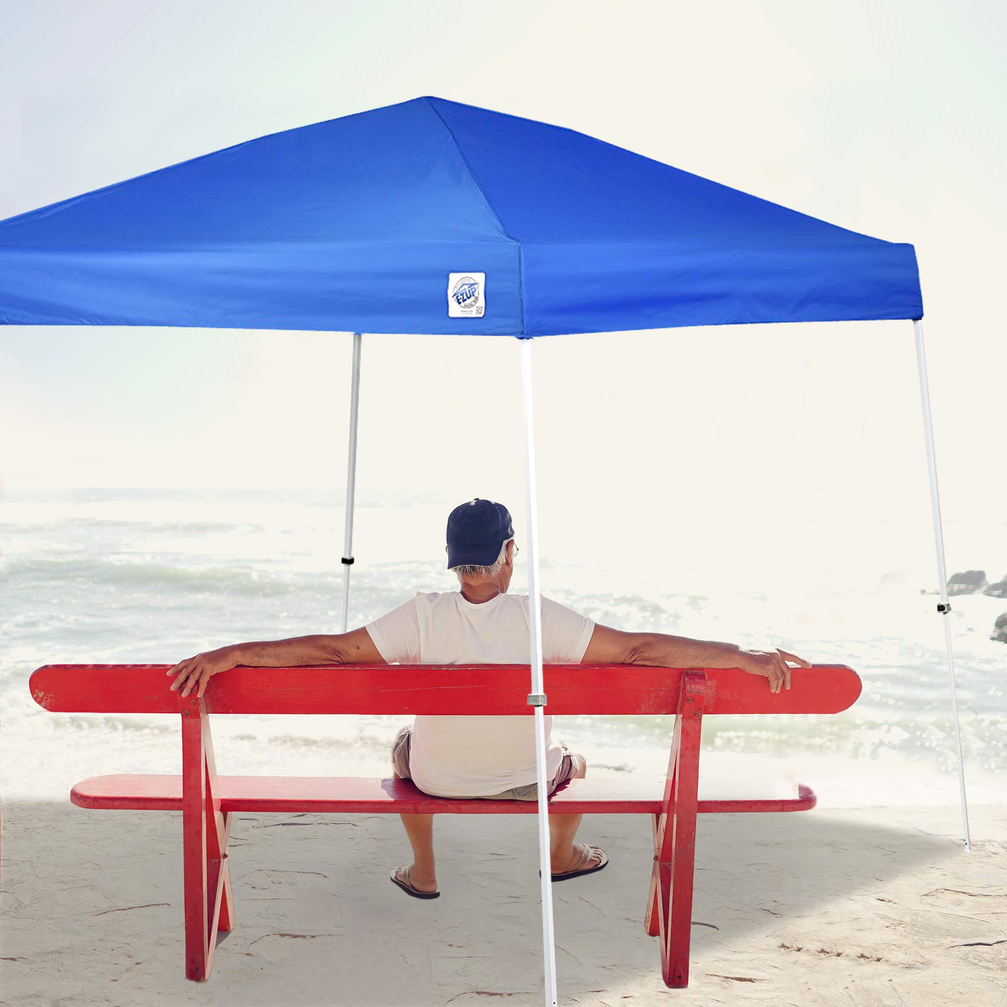 E-Z UP canopy set up at beach providing portable sun protection