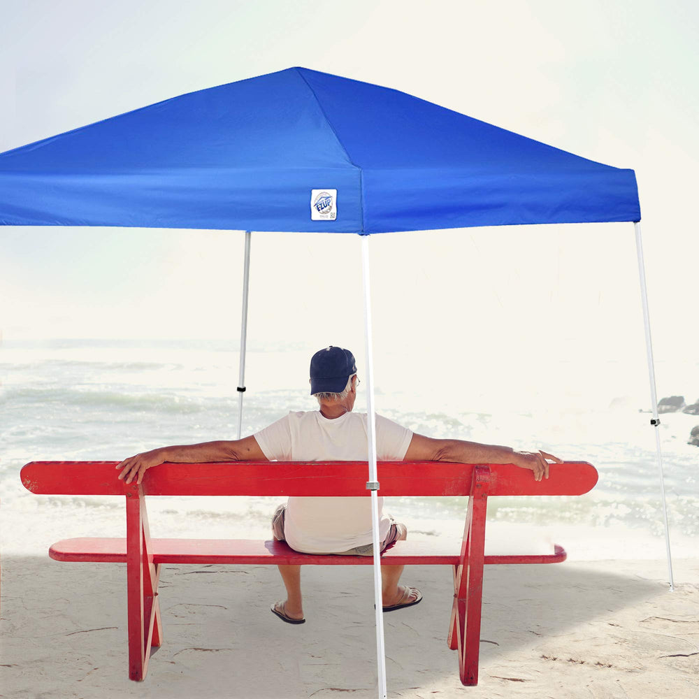 E-Z UP canopy set up at beach providing portable sun protection