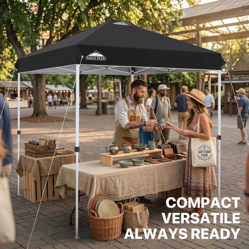 EAGLE PEAK canopy set up at a market providing shaded booth