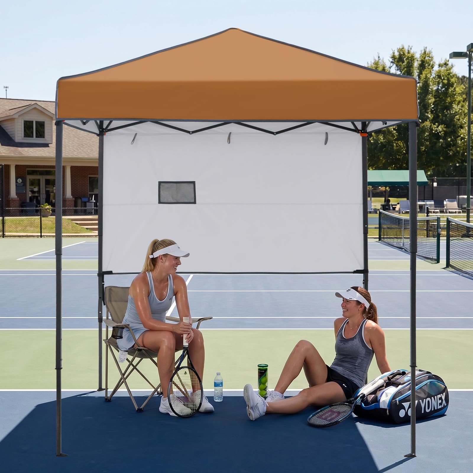 EAGLE PEAK canopy in beach use providing instant shade for family comfort