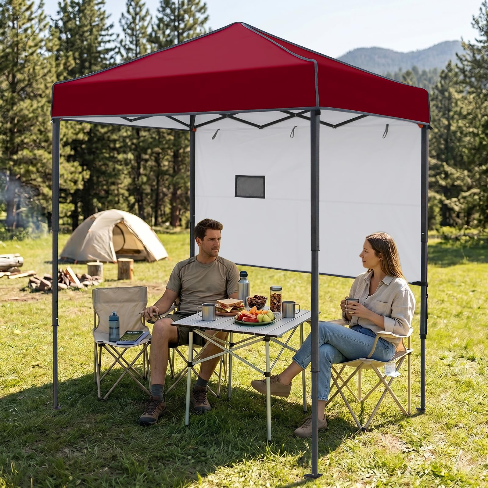 EAGLE PEAK canopy in use at a beach showcasing portable shade for relaxation