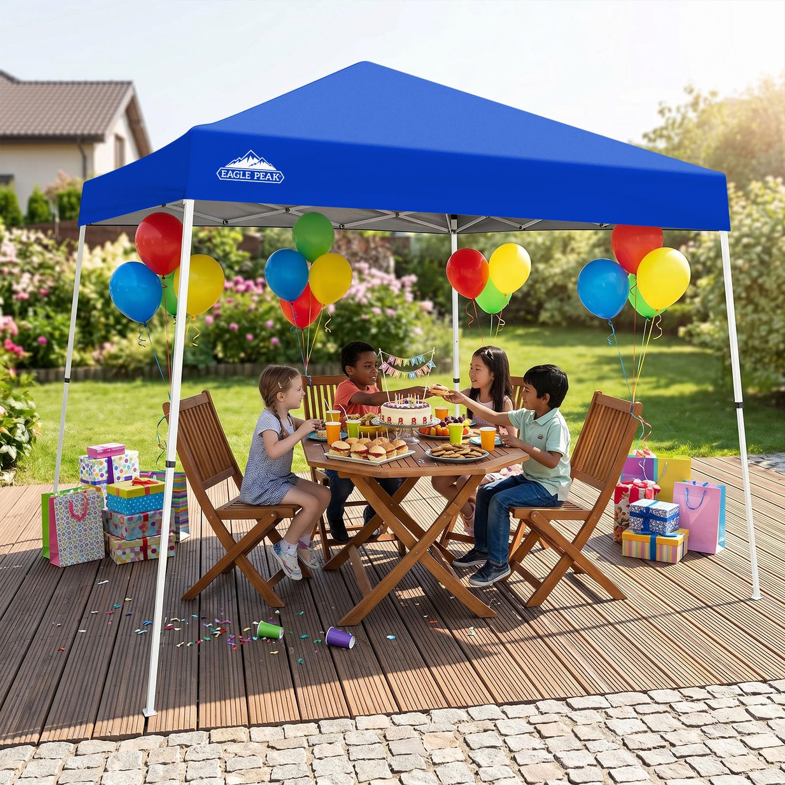 EAGLE PEAK canopy beside chairs illustrating true 10x10 base coverage