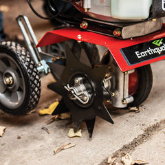 EARTHQUAKE edger in use along sidewalk illustrating crisp, uniform borders