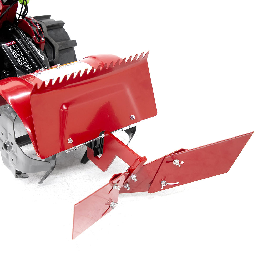 EARTHQUAKE hiller-furrower mounted on Pioneer tiller in field demonstrating precise row formation
