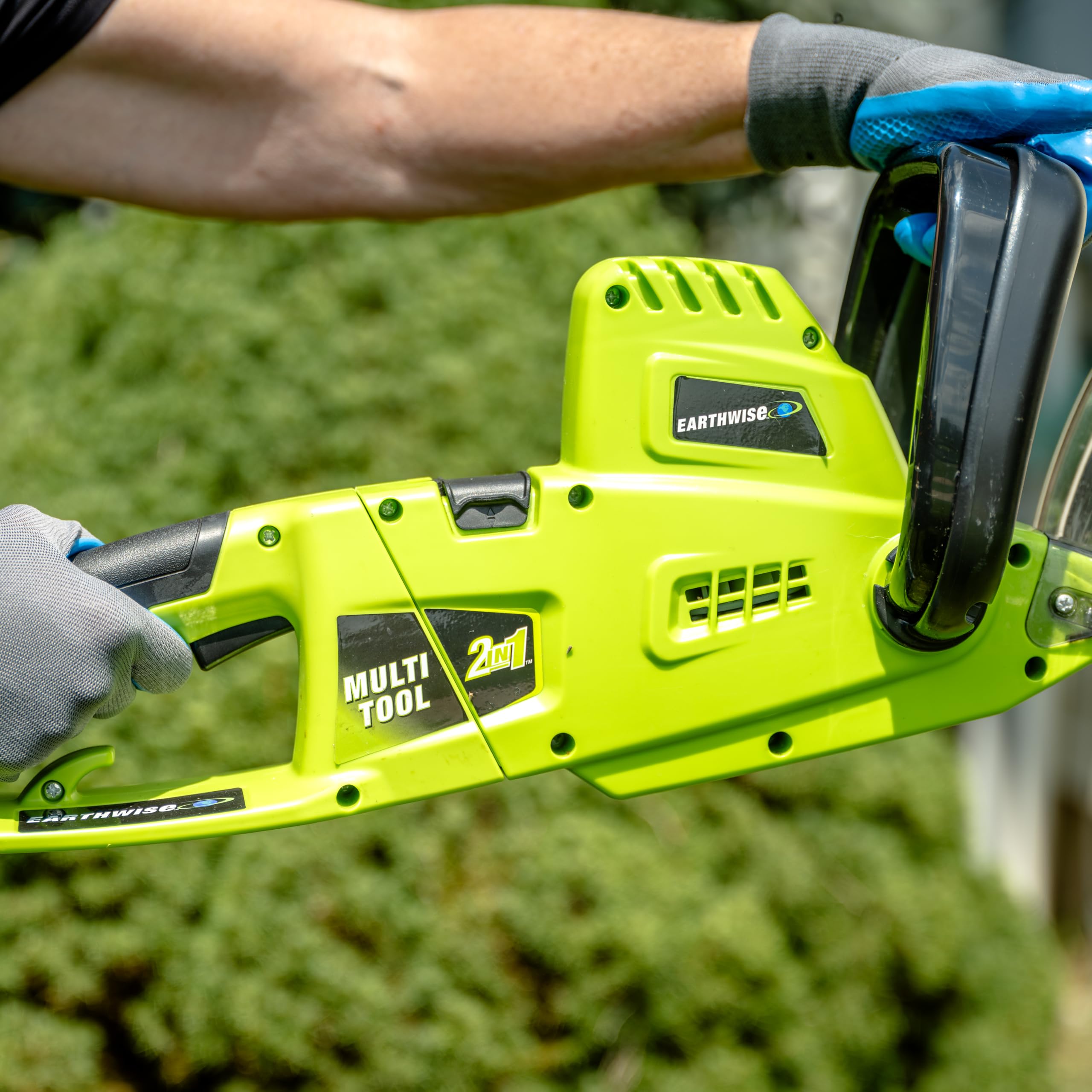 Earthwise close-up of 18-inch blade delivering clean cuts on shrubs