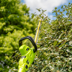 Earthwise pole extension attached to reach high hedges safely