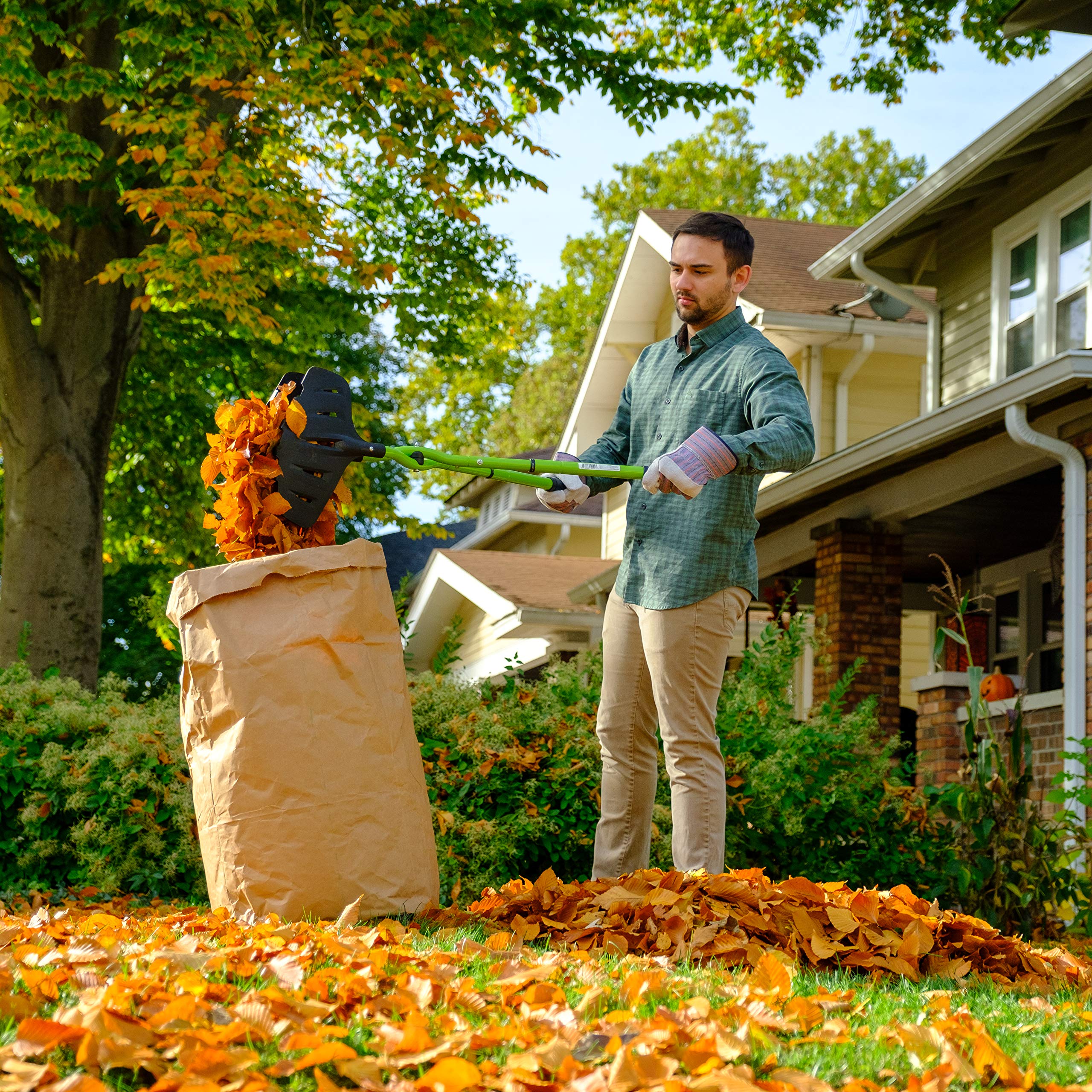 Earthwise Gator Grabber picking up leaves outdoors for faster yard work