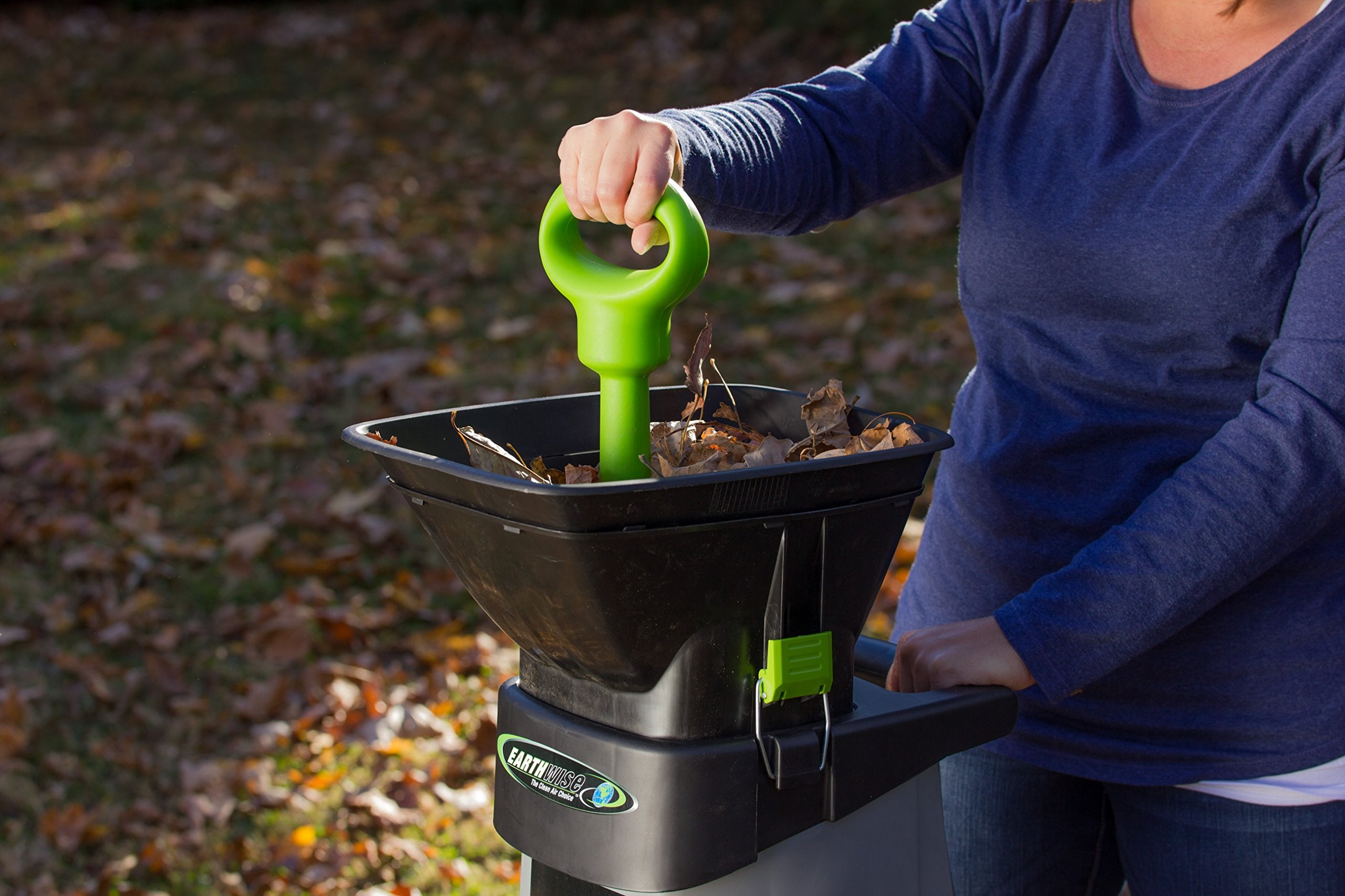 Earthwise GS70015 next to a ruler showing branch diameter capacity for sizing