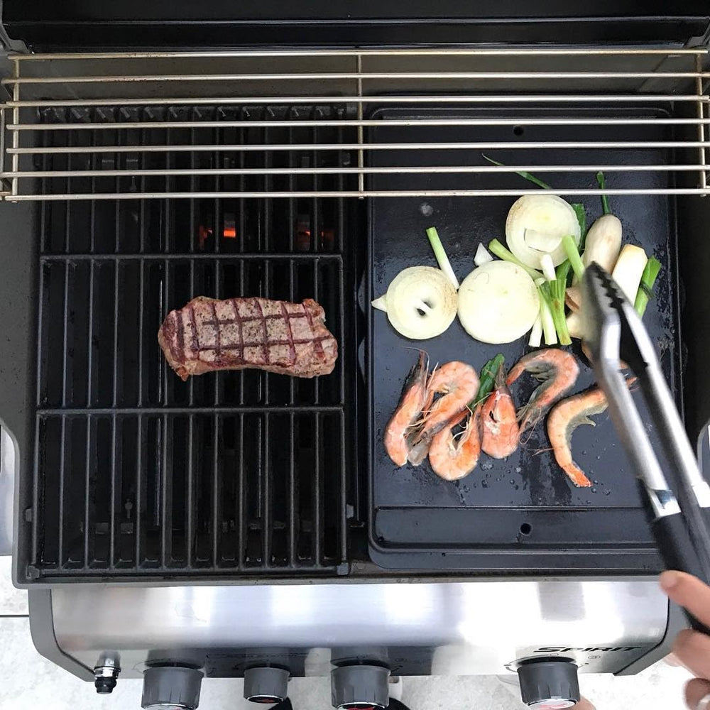 EasiBBQ griddle searing steak demonstrating even heat and browning benefit