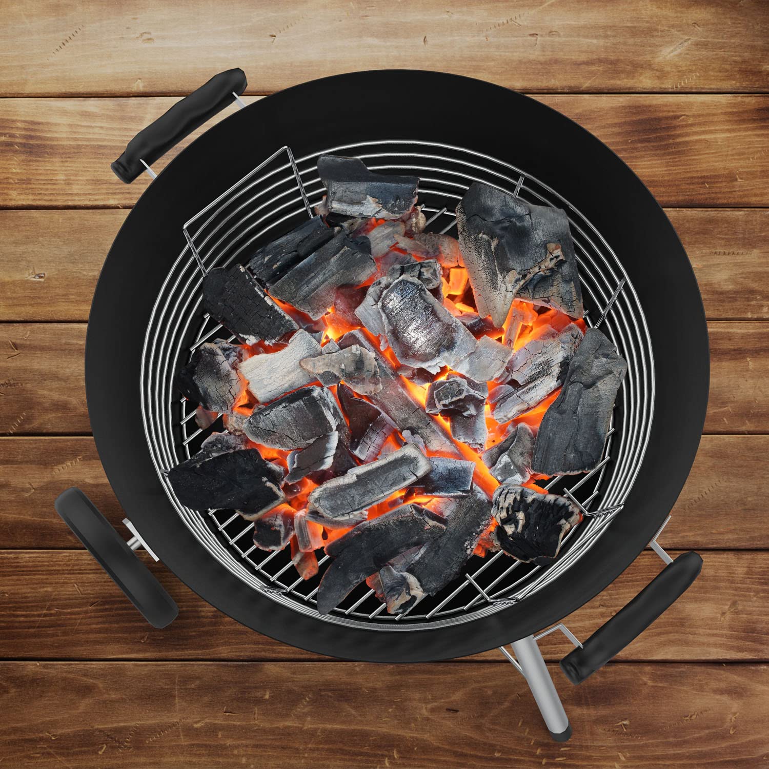 EasiBBQ ash basket in a backyard kamado setup improving organization and cook readiness