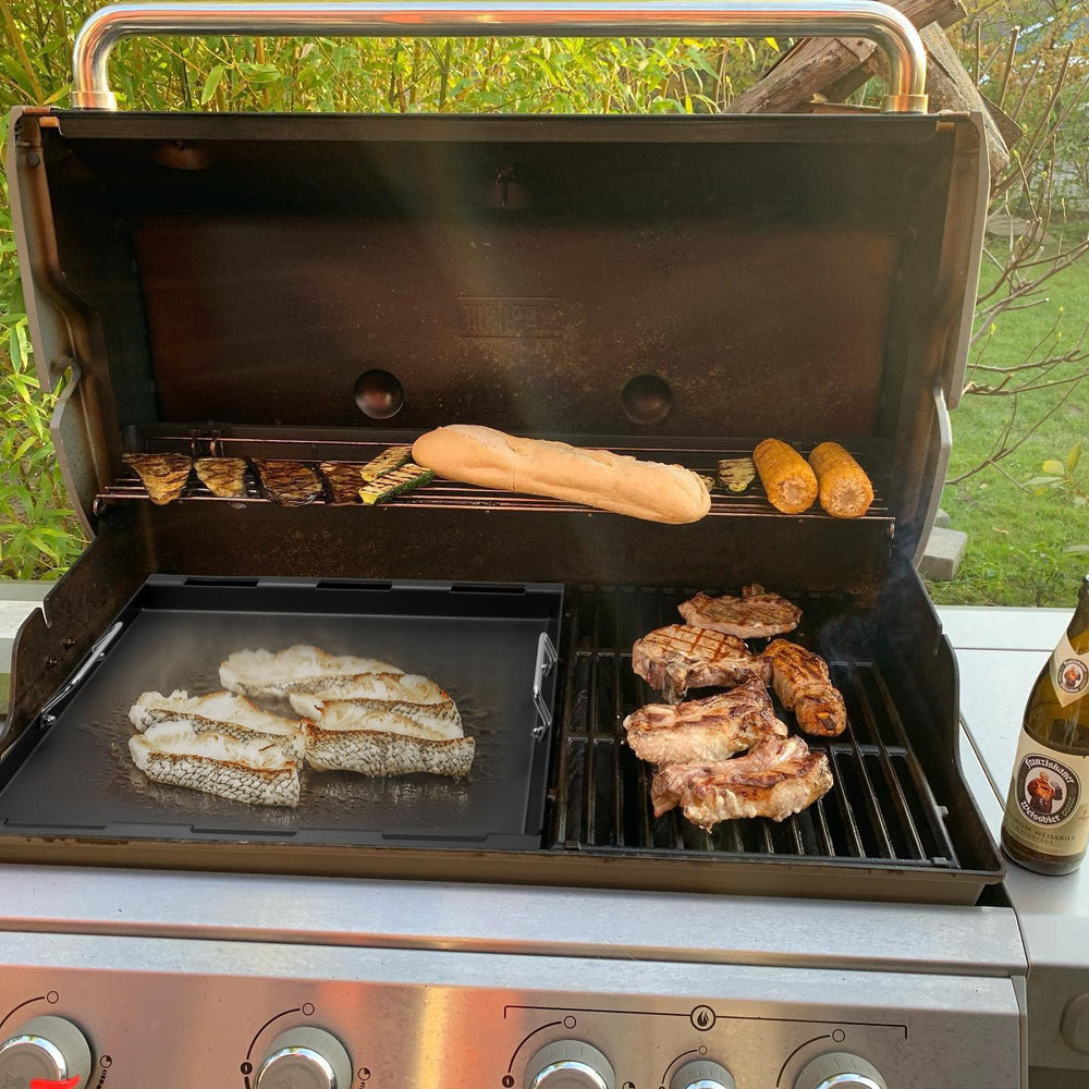 EasiBBQ griddle in use cooking pancakes for even browning and easy flipping