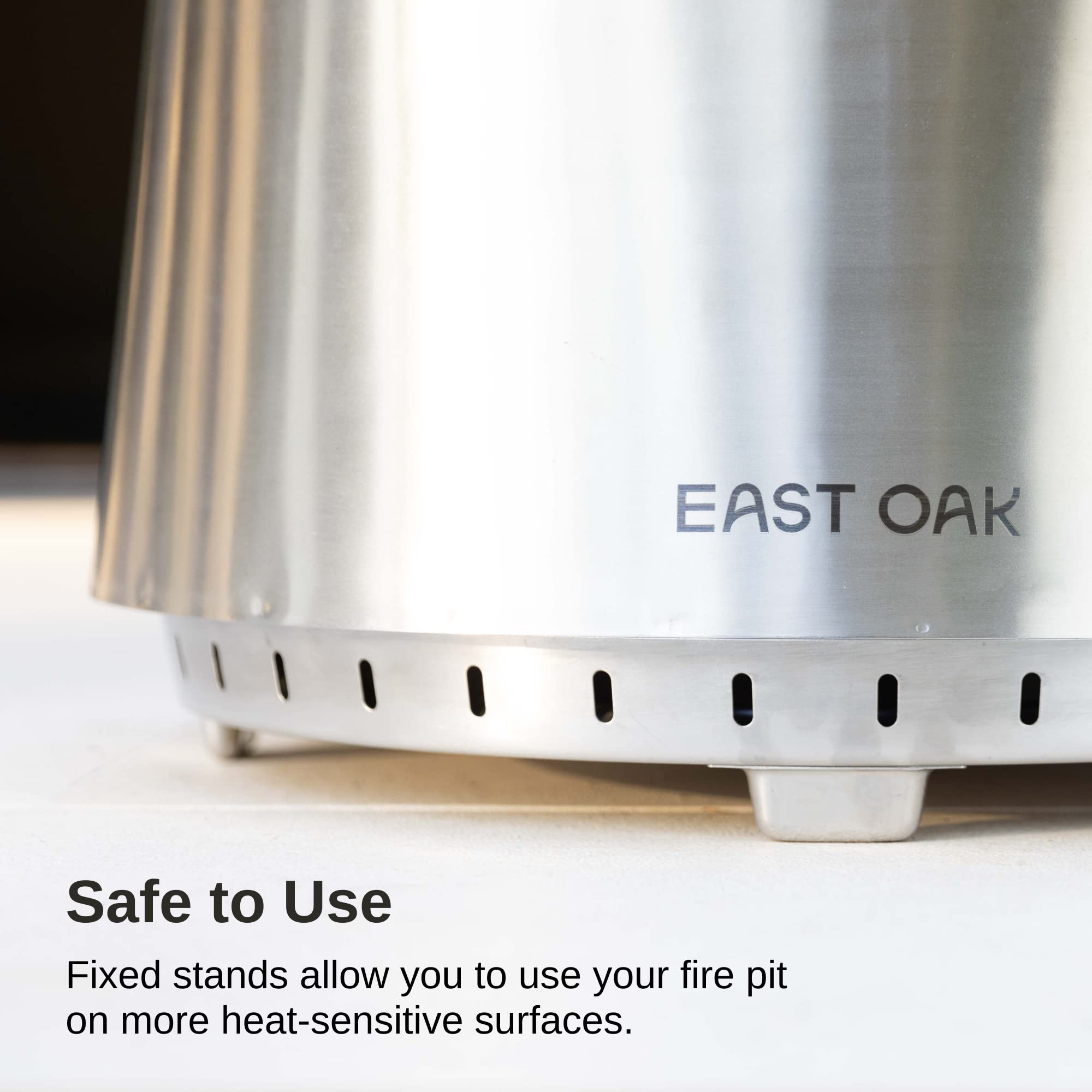 EAST OAK ash pan and poker displayed for easy cleanup and mess-free maintenance benefit