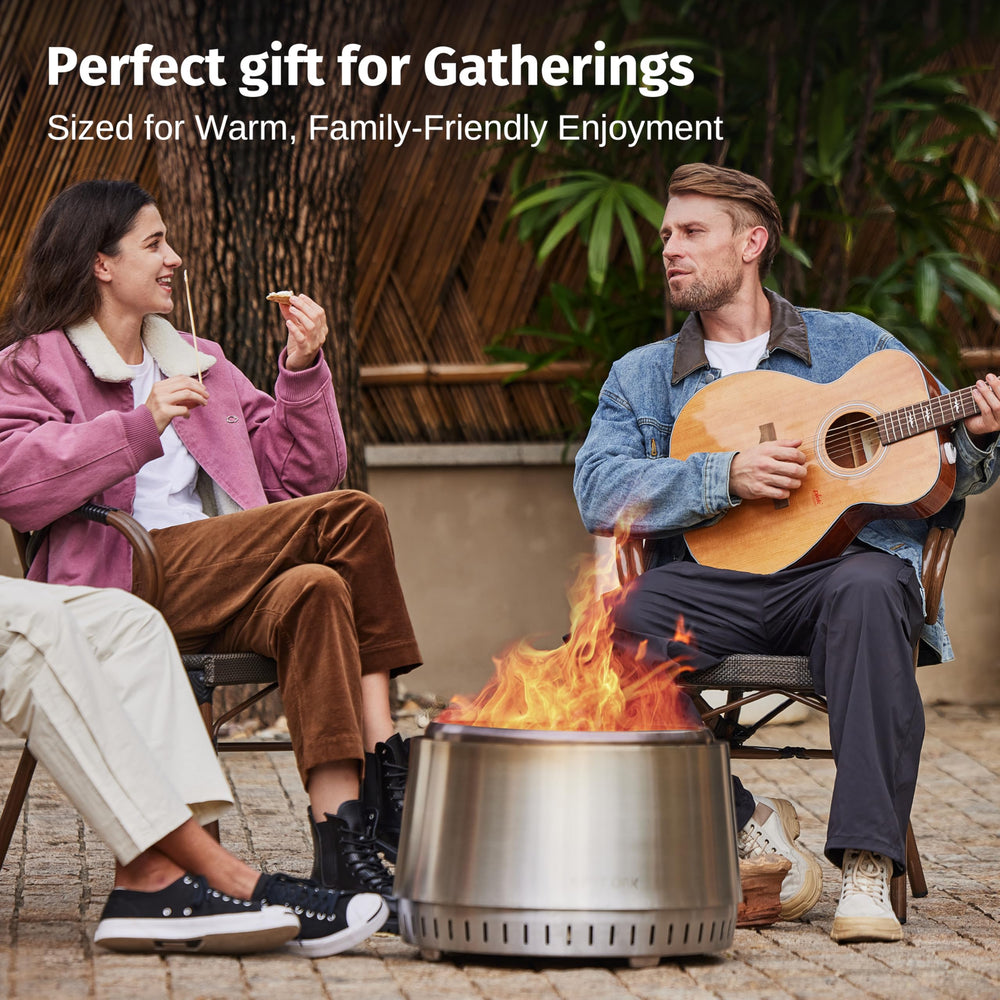 EAST OAK Fuoco next to stacked firewood to show 21-inch scale and fuel compatibility