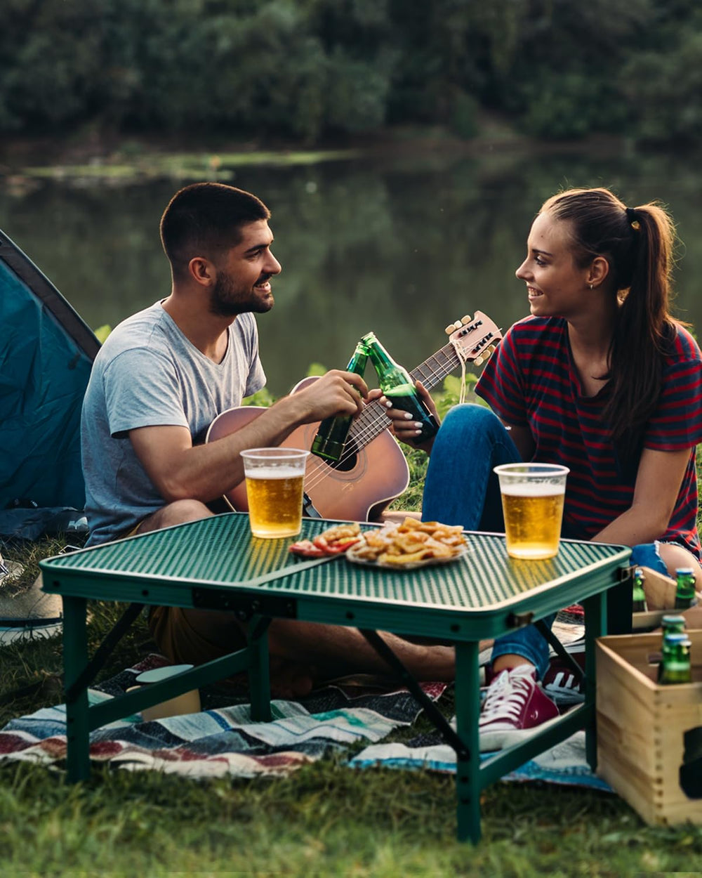 E EASTSTORM table in use with grill, stable surface for outdoor cooking benefit