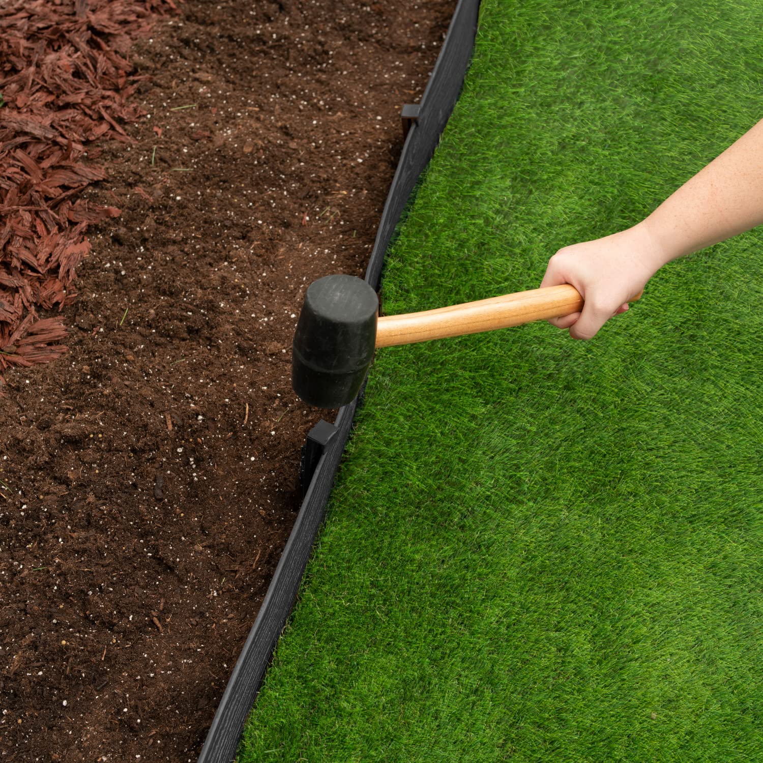 EasyFlex installed edging in flower bed showing neat separation and containment benefit