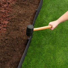 EasyFlex installed edging in flower bed showing neat separation and containment benefit