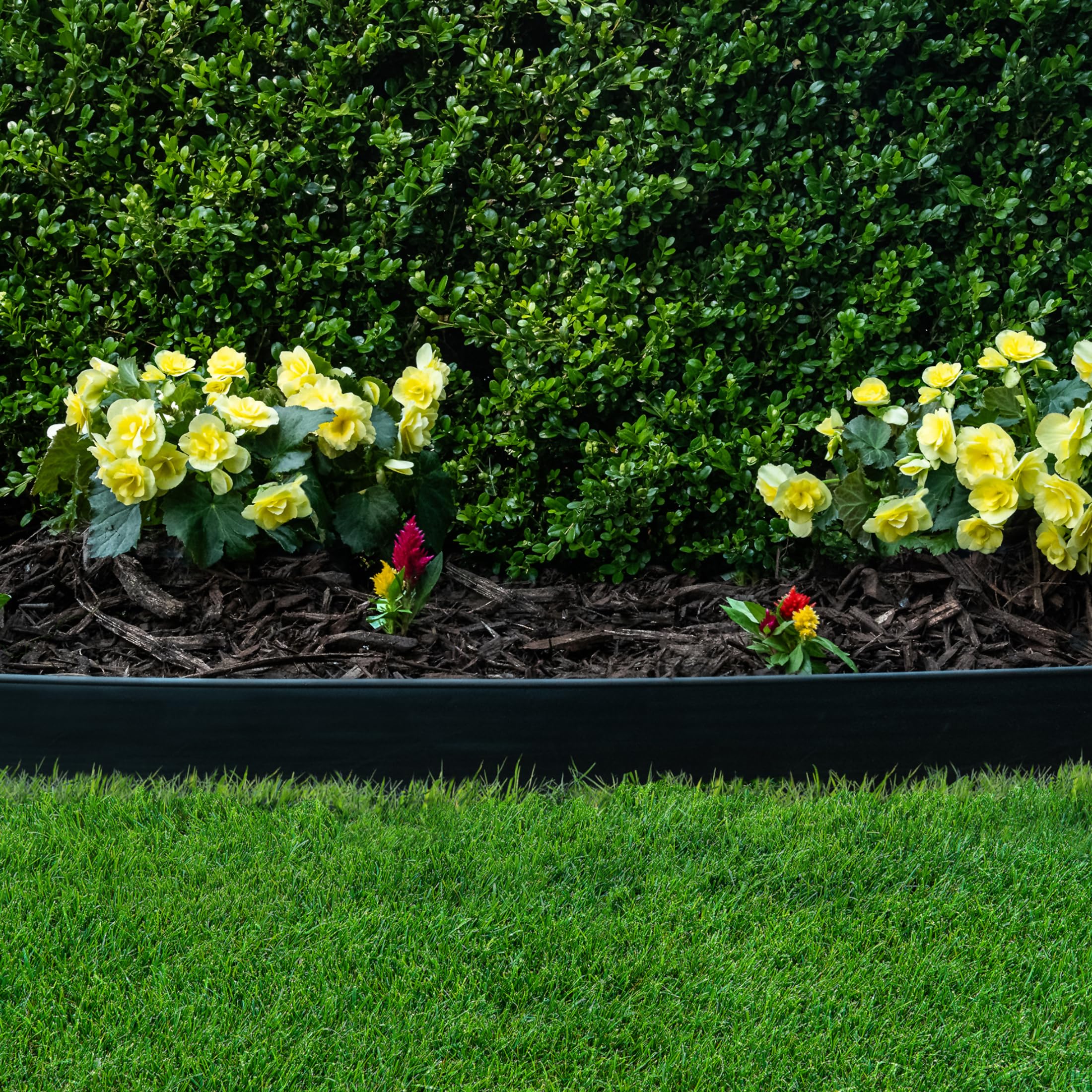 EasyFlex holding deep mulch and river rock, prevents material from spilling