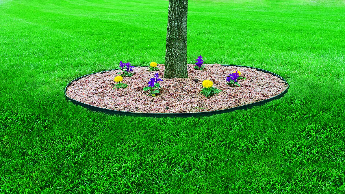 EasyFlex next to yard tools for scale showing 100-foot kit covers long borders