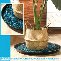 Eccliy saucer beneath patio planter resisting outdoor runoff and dirt