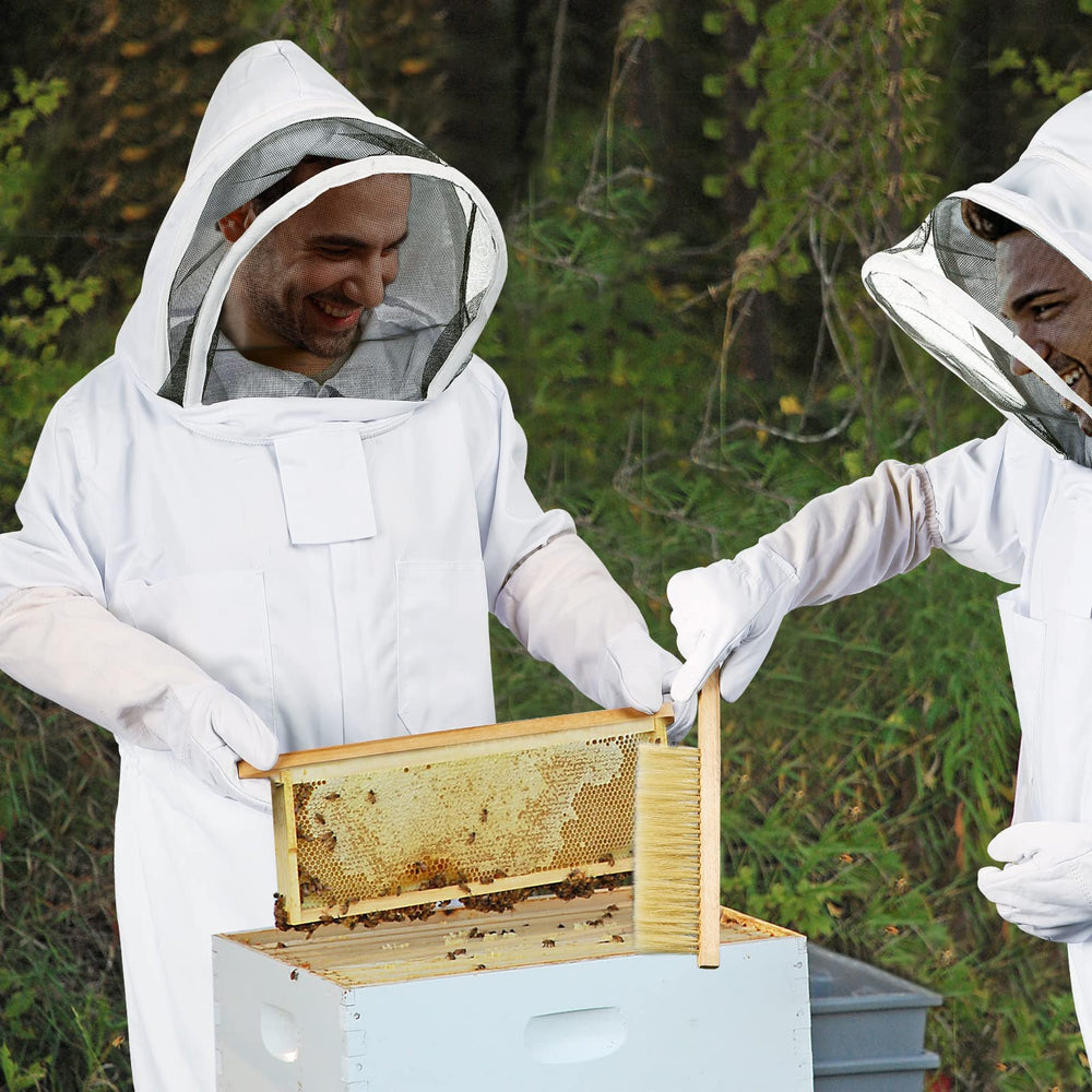 ECKXCH suit in use at hive inspection demonstrating safe handling