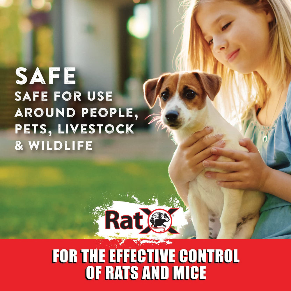 EcoClear RatX placed near a barn foundation illustrating outdoor agricultural placement