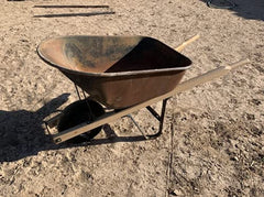 Edward Tools installed handles on wheelbarrow demonstrating stable grip and control