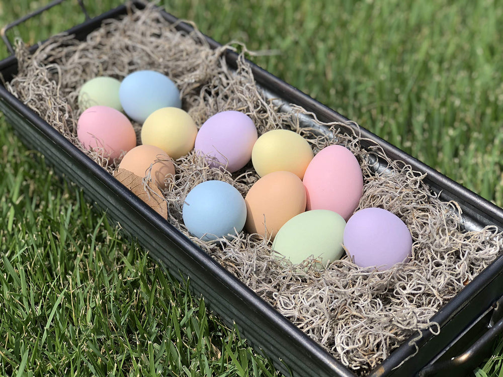 Eggcetera eggs arranged in a decorative nest suggesting cozy home display