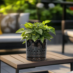 Eightpot saucer and drainage hole detail preventing spills and protecting surfaces