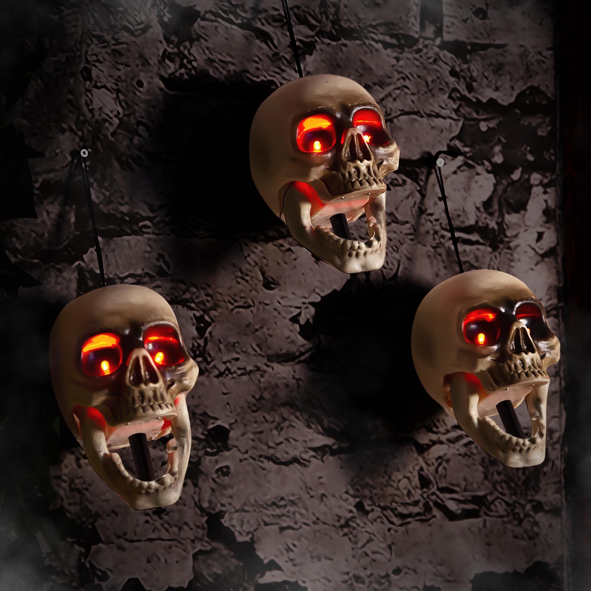 ELAMAS front view of three hanging skulls creating instant Halloween atmosphere