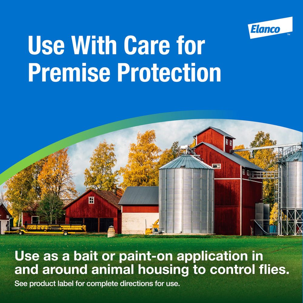 Elanco QuickBayt scattered outside a barn illustrating perimeter fly protection