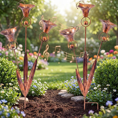 ElaraBerry front view of two copper calla lily stakes showing warm sheen and shape