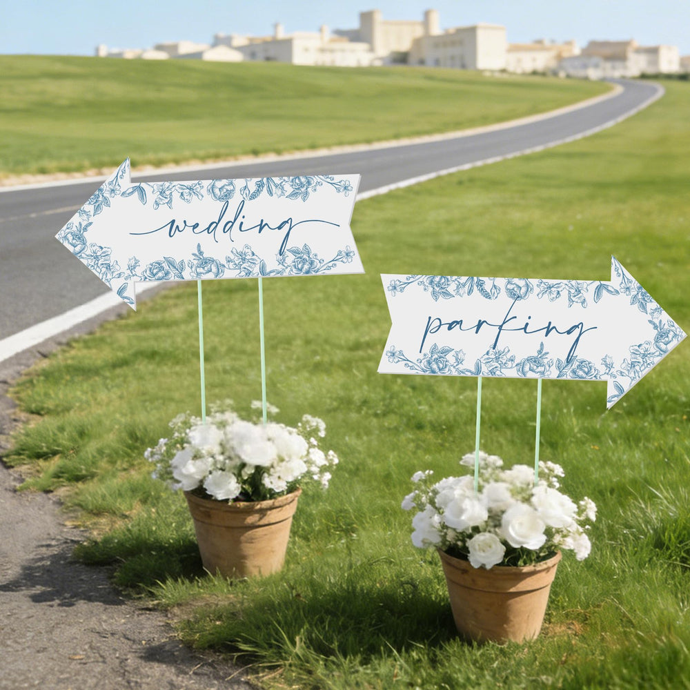 ElasignShopo multiple signs placed along driveway guiding guests with visible arrows and labels