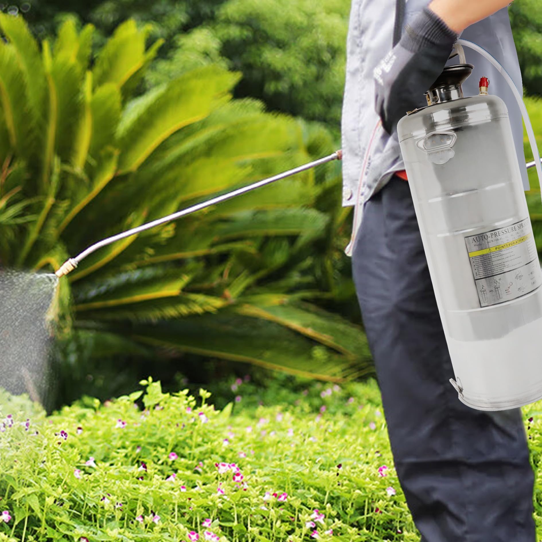 elfinrm in use watering hanging plants with extended wand for comfortable reach