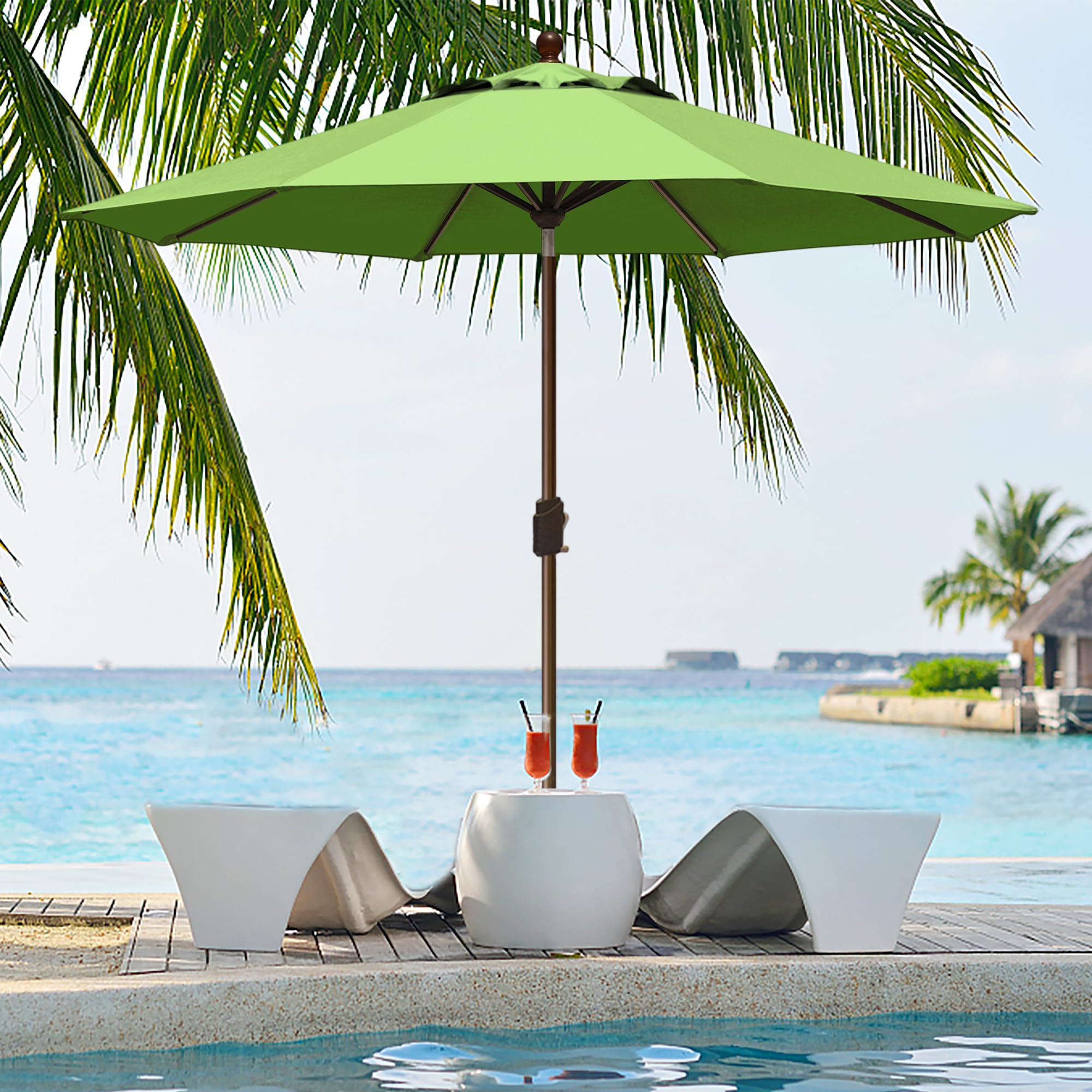 EliteShade poolside lifestyle scene protecting loungers from sun