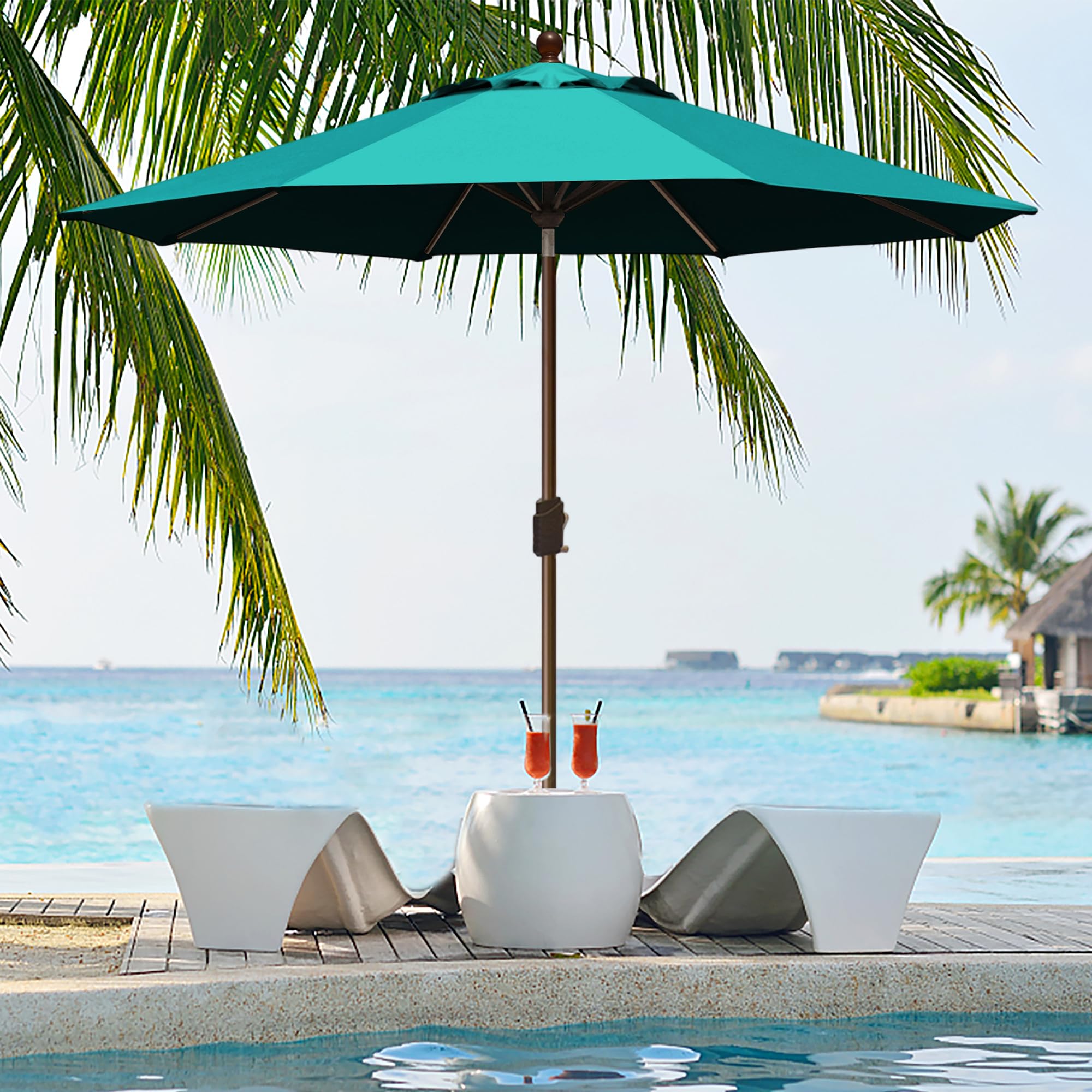 EliteShade poolside umbrella creating cool shaded area for lounging