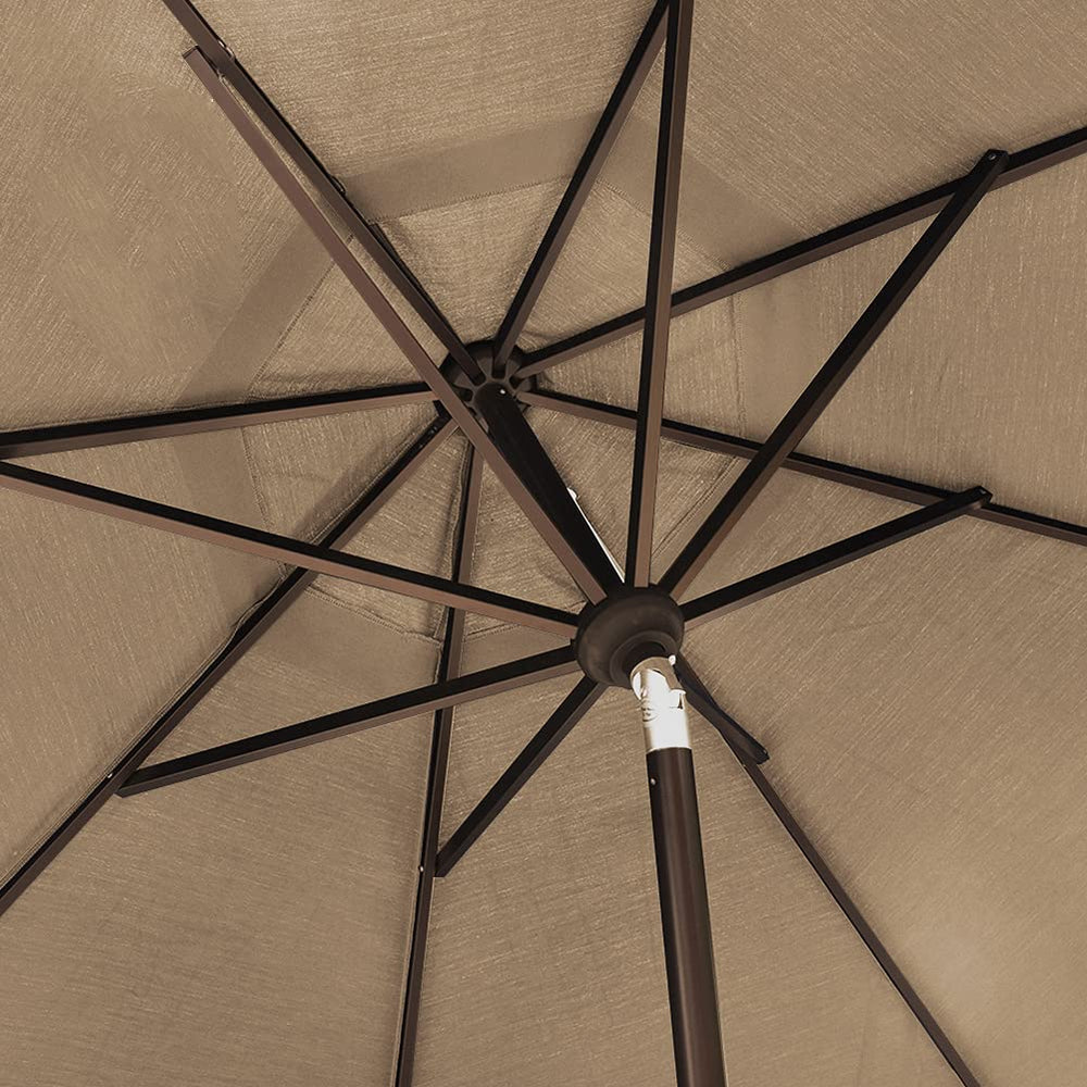 EliteShade next to patio chair showing 10ft size and real-world scale advantage
