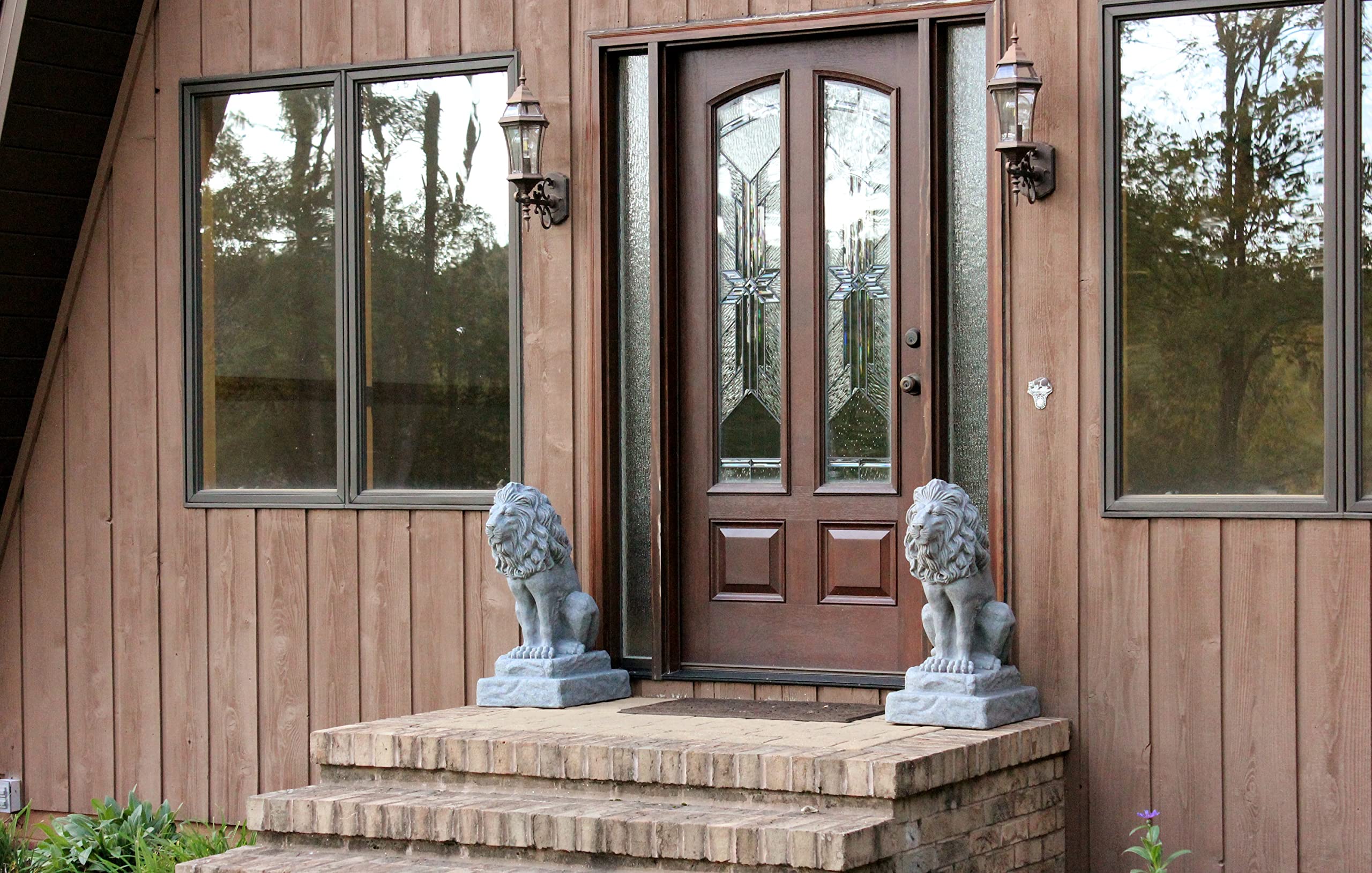 Emsco Group guardian lion at a doorway providing decorative symmetry and welcome