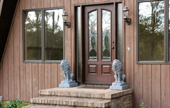 Emsco Group guardian lion at a doorway providing decorative symmetry and welcome