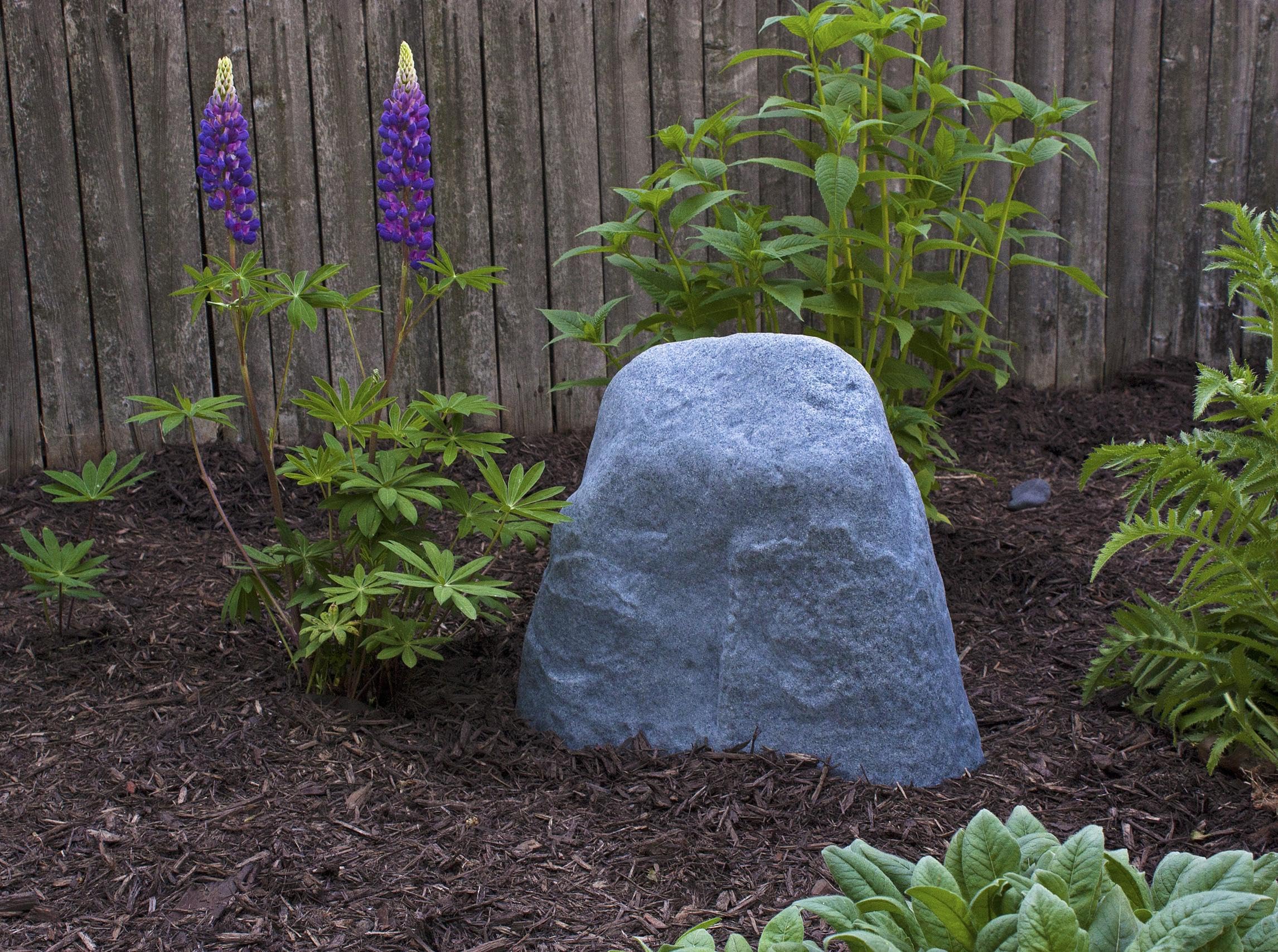 Emsco Group 2186 placed in garden bed blending with plants and mulch