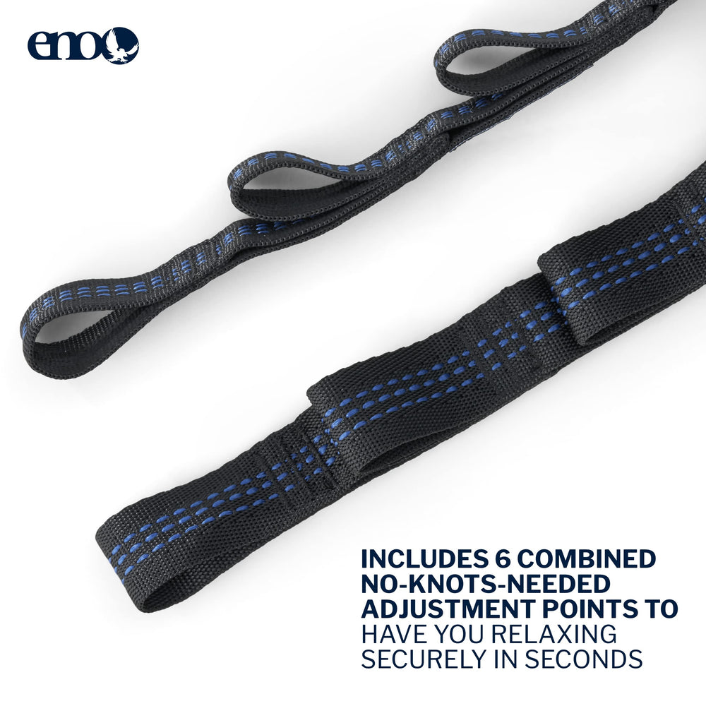 ENO hanger next to a key for scale showing compact size and discreet wall profile