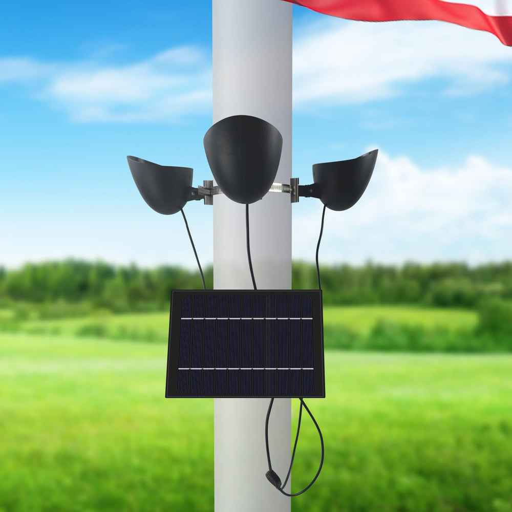 enrybia downlighting a flower bed under pole highlighting versatile landscape lighting benefit