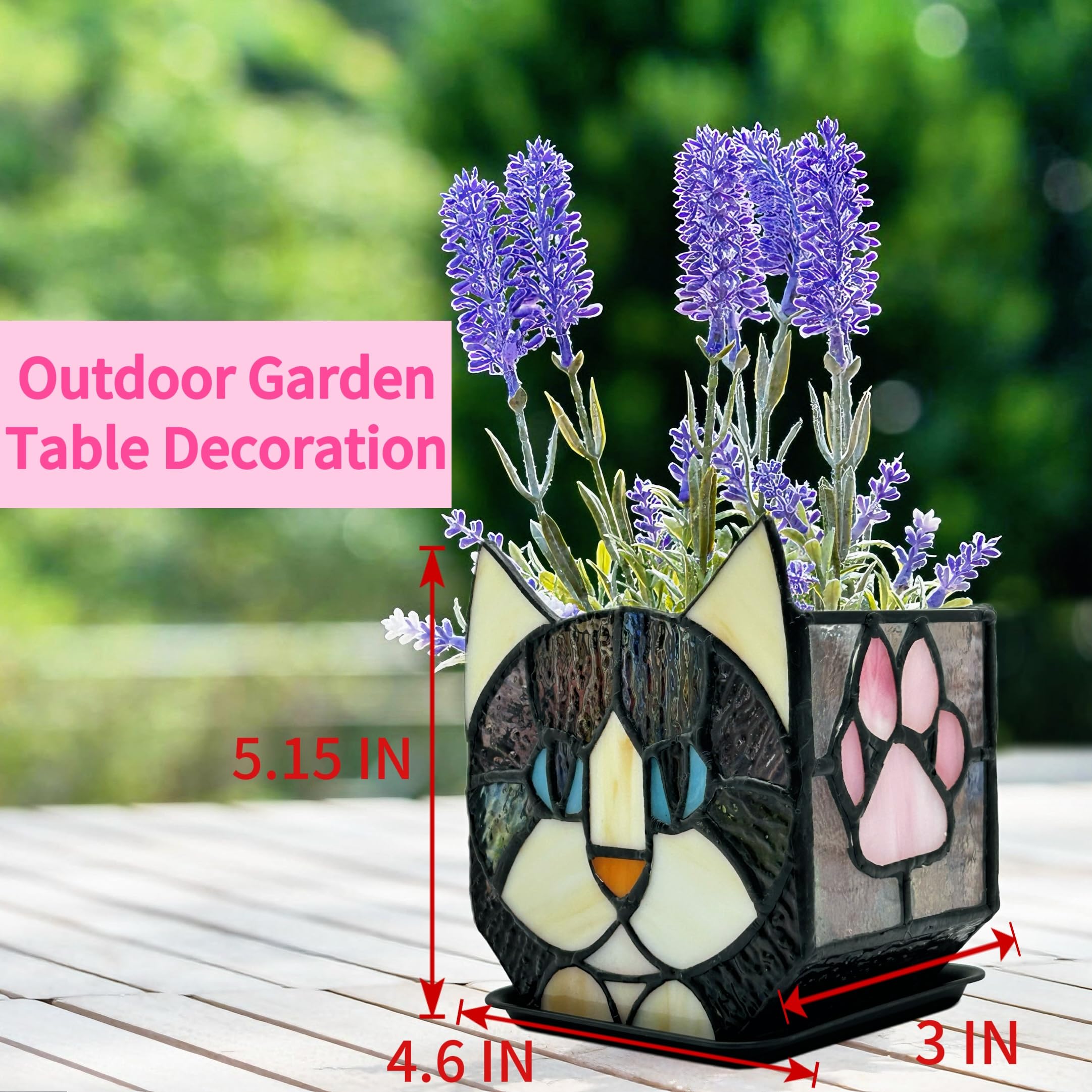 Entlityful black cat planter underside view of drainage hole and label, showing practical watering control