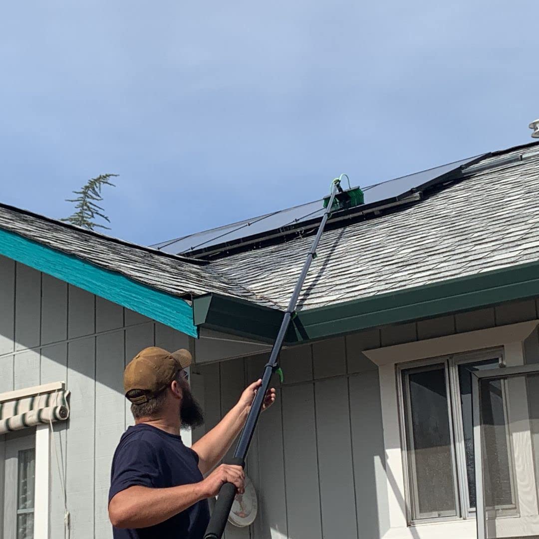 EQUIPMAXX cleaning a second-story window from ground level easily